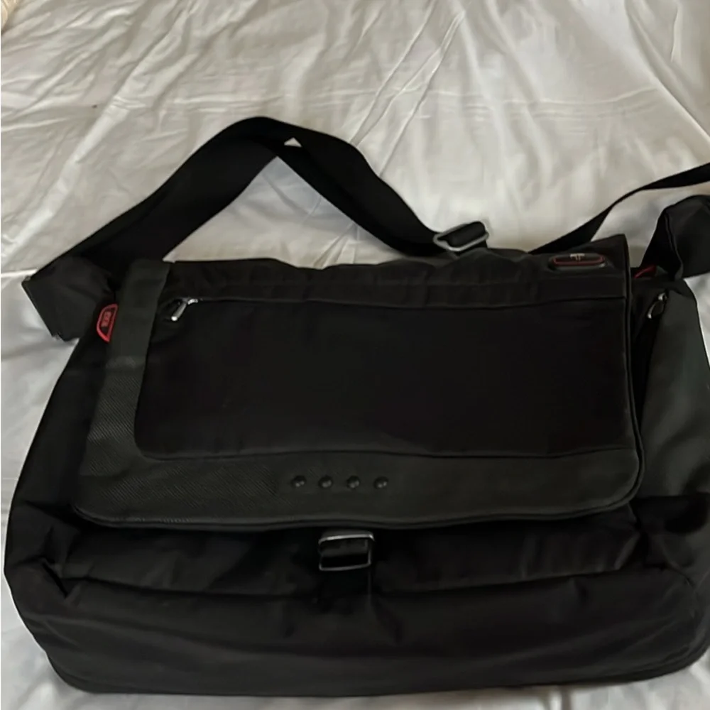 Tumi new, laptop bag.